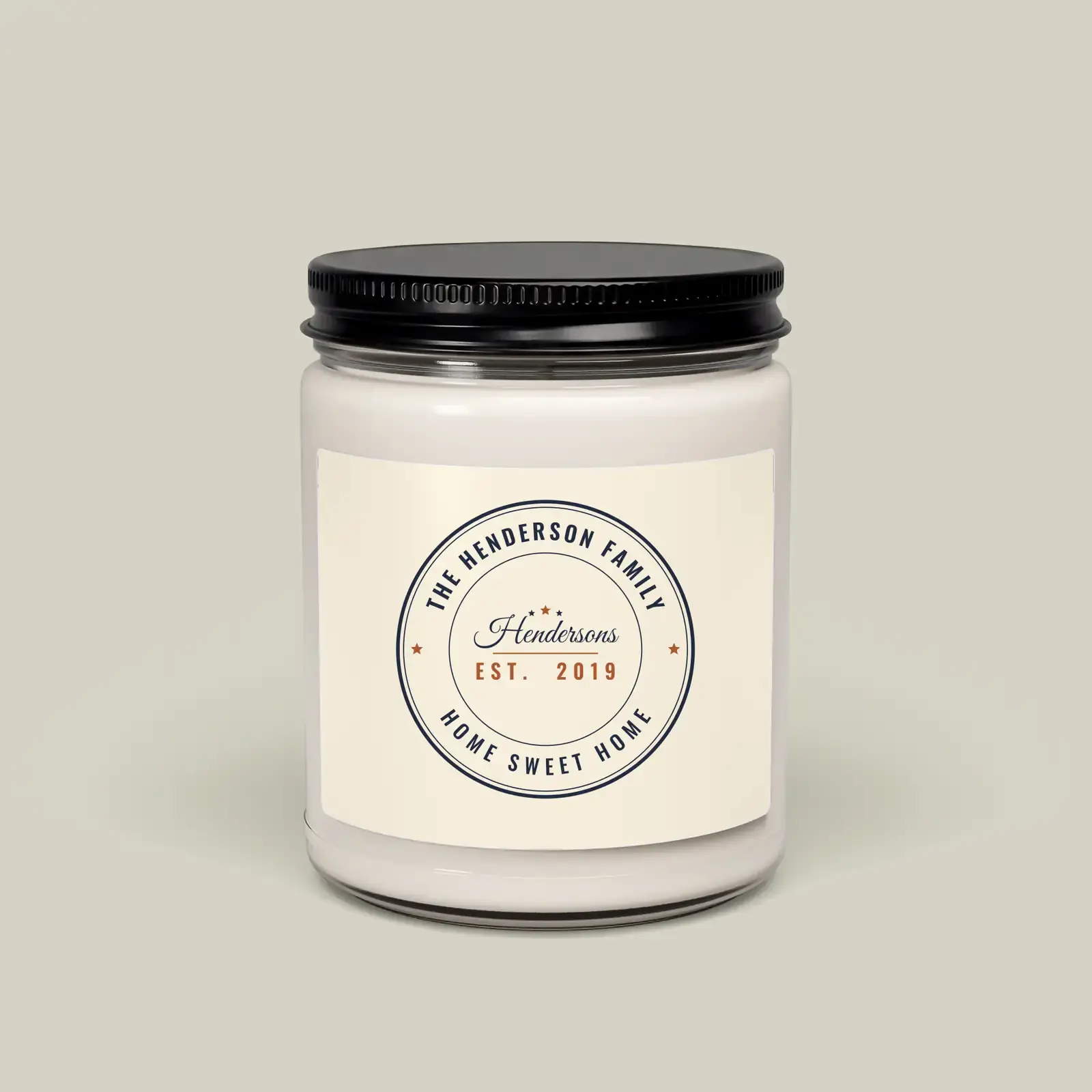 "The Hendersons, Est. 2019", an example design by Vessim, printed on a soy candle