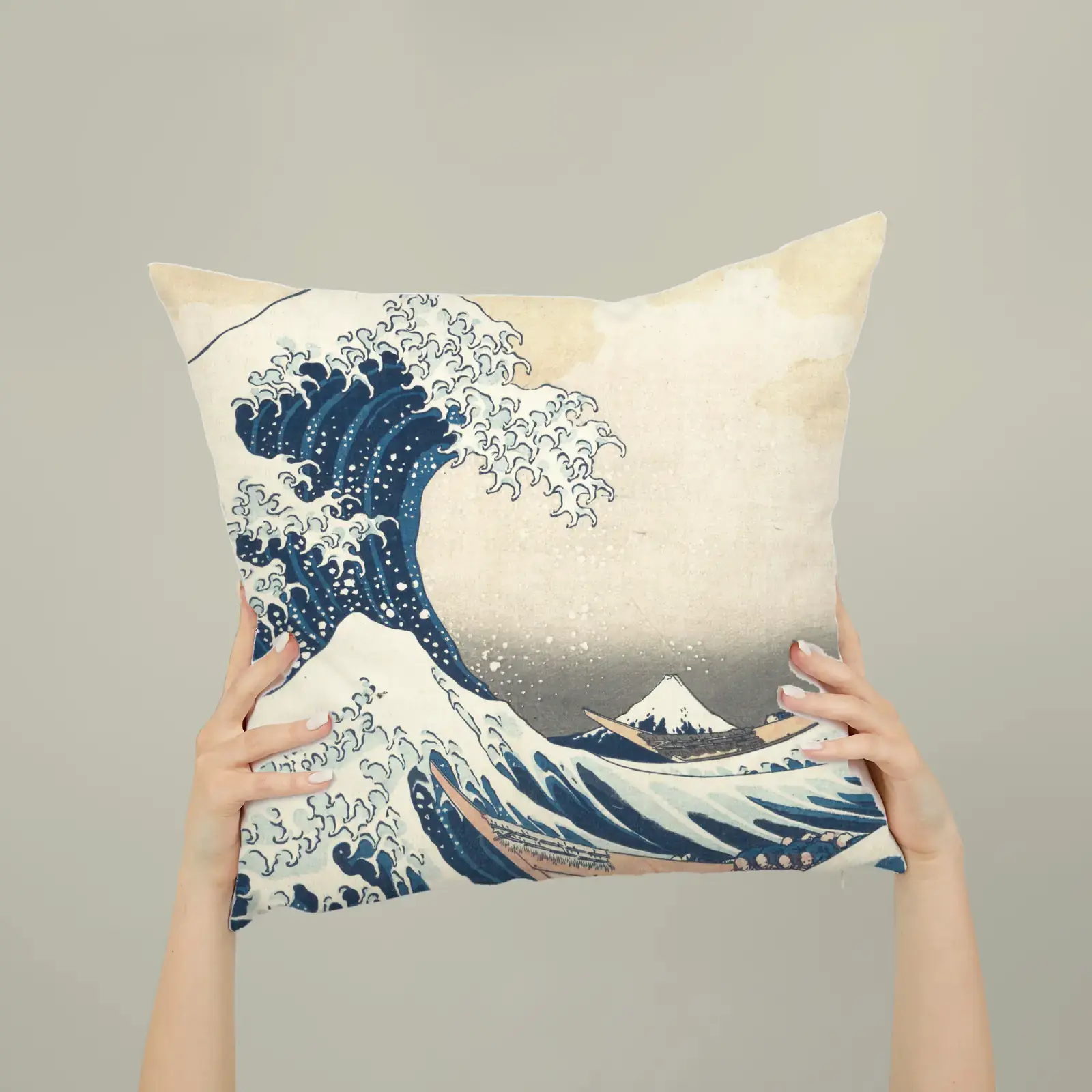 Square pillow shown with The Great Wave off Kanagawa by Katsushika Hokusai, a public-domain example