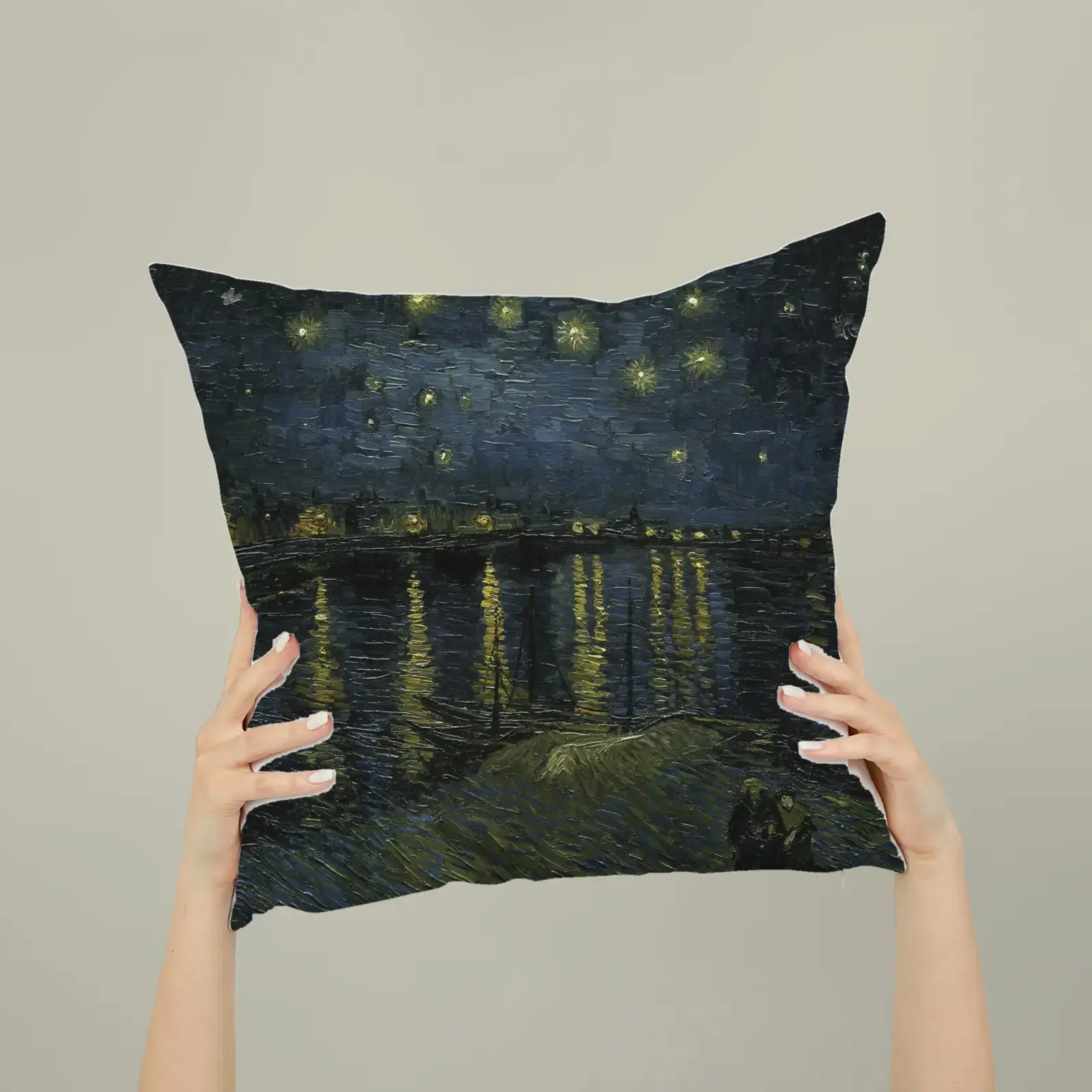 Square pillow shown with Starry Night Over the Rhône by Vincent van Gogh, a public-domain example