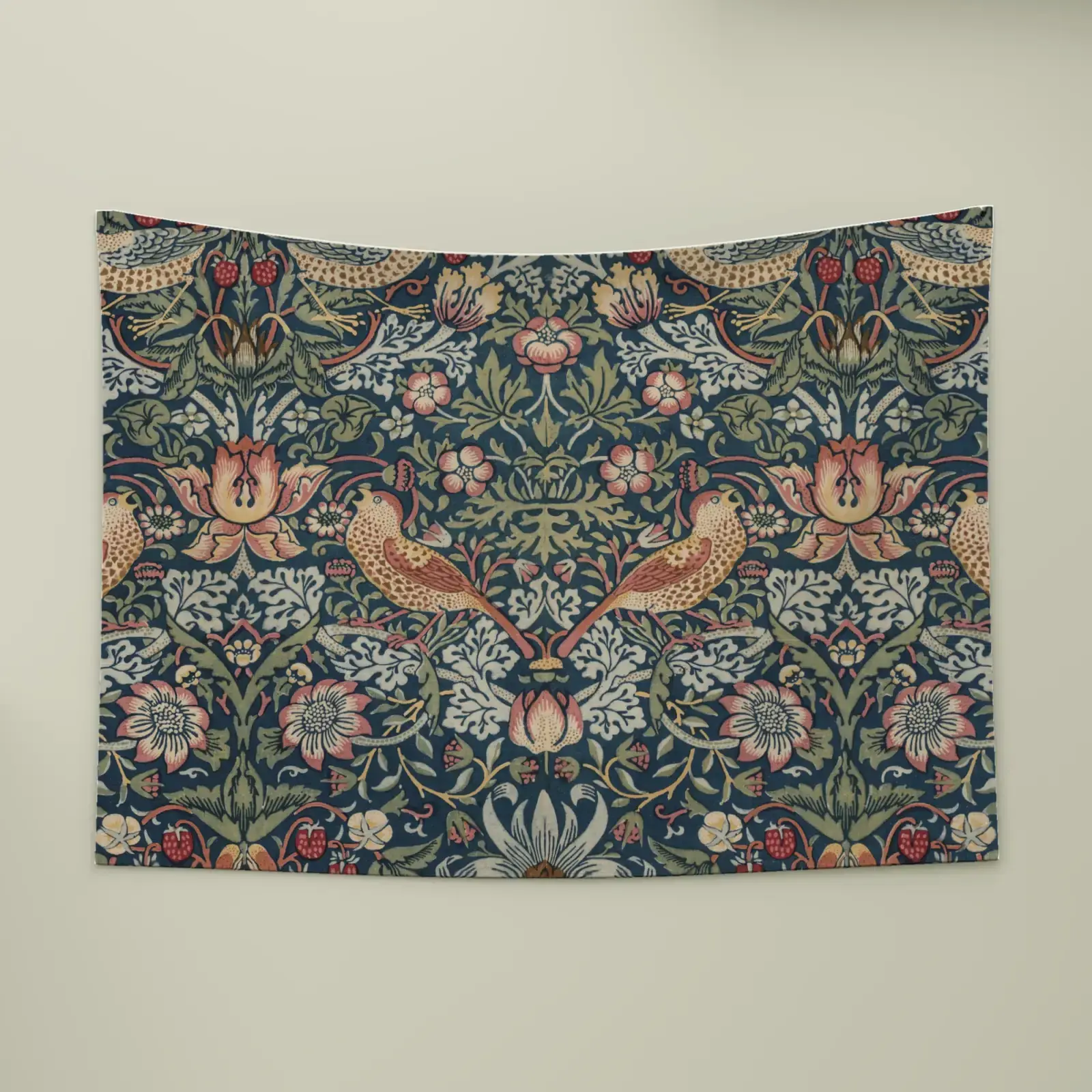 Strawberry Thief by William Morris, printed on a wall tapestry