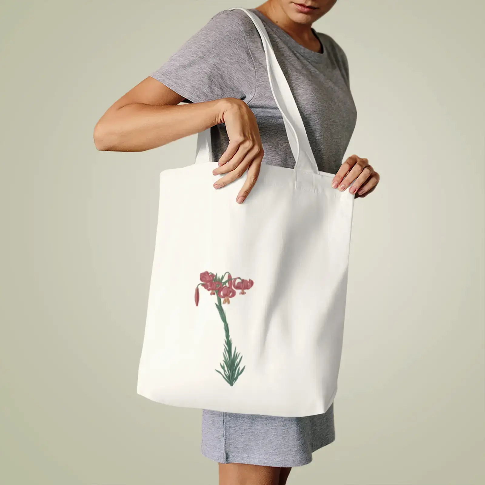 A motif from Turban Lily, from Les Liliacées by Pierre-Joseph Redouté, printed on a tote bag