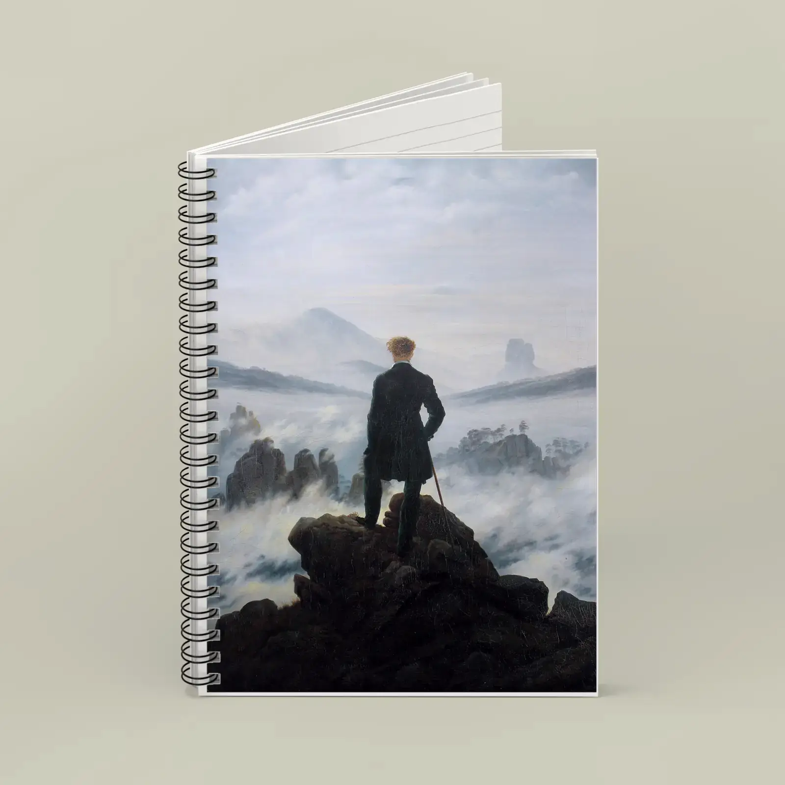 Spiral notebook shown with Wanderer above the Sea of Fog by Caspar David Friedrich, a public-domain example